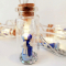 Mini-Lights - Kussend paartje - 10 decoratieve glazen flesjes met ledverlichting (met timer). 1,80 meter Voor gebruik binnenshuis. Werkt op 2 x 1,5V AA batterijen. ( niet bijgeleverd)